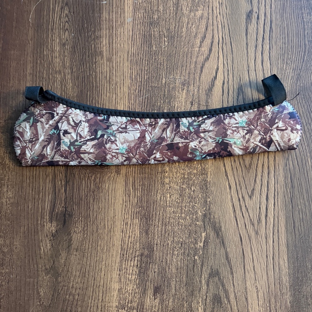 Camouflage-patterned neoprene scope cover